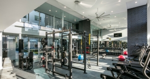 The Beacon fitness center with full weight equipment and cardio machines