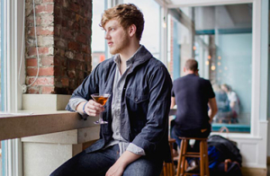 Man Drinking Thoughtfully