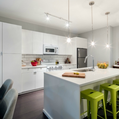 Beacon Full Euro-style kitchen with white cabinets and countertops