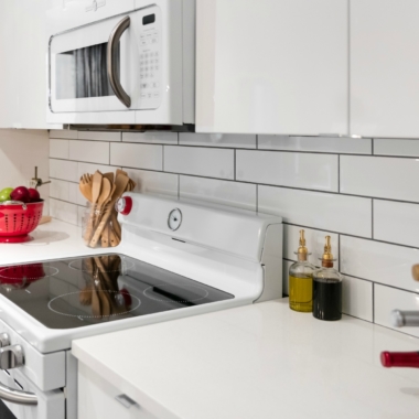 Oven and microwave matching the fully white kitchen